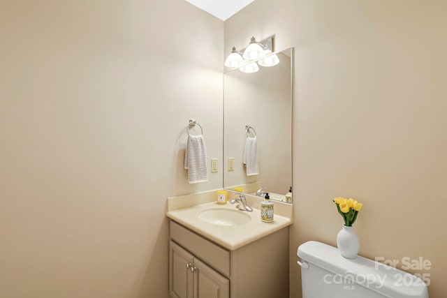 143 Wildflower Ln, Sugar Mountain, NC 28604 - bathroom with toilet and vanity