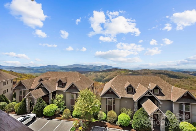 143 Wildflower Ln, Sugar Mountain, NC 28604 - view of front of house featuring uncovered parking and a mountain view