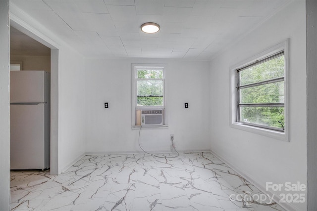 3614 Frank Whisnant Rd, Morganton, NC 28655 - empty room with healthy amount of natural light, light marble finish flooring, cooling unit, and baseboards