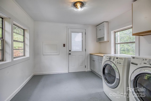 3614 Frank Whisnant Rd, Morganton, NC 28655 - clothes washing area with washing machine and dryer, cabinet space, plenty of natural light, and baseboards