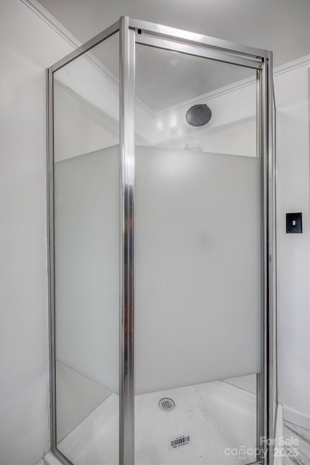 3614 Frank Whisnant Rd, Morganton, NC 28655 - full bathroom featuring a stall shower and ornamental molding