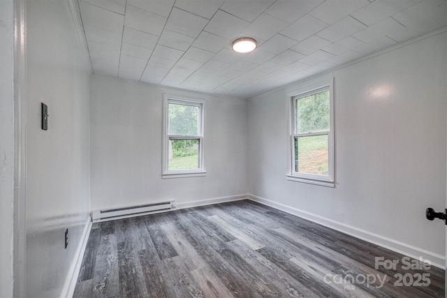 3614 Frank Whisnant Rd, Morganton, NC 28655 - unfurnished room with baseboard heating, plenty of natural light, wood finished floors, ornamental molding, and baseboards
