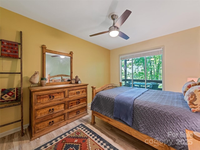 76 Shirley Dr, Maggie Valley, NC 28751 - bedroom featuring wood finished floors, a ceiling fan, and baseboards