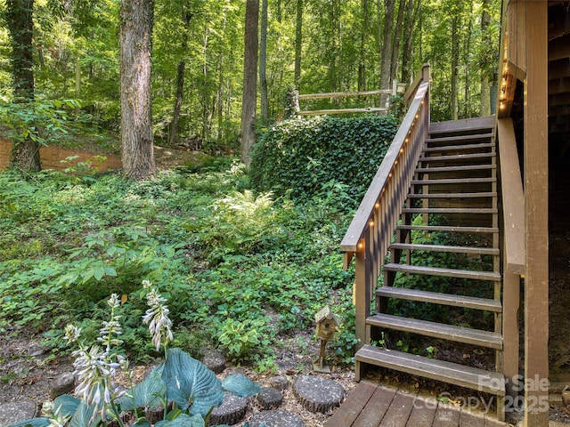76 Shirley Dr, Maggie Valley, NC 28751 - staircase featuring a view of trees