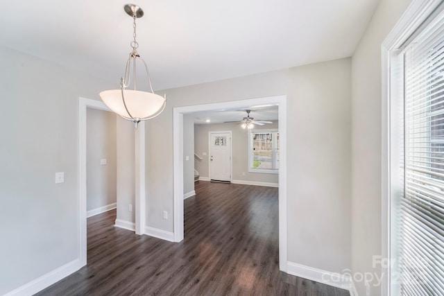 668 Smith St, Kannapolis, NC 28083 - empty room featuring dark wood-style flooring, baseboards, and ceiling fan