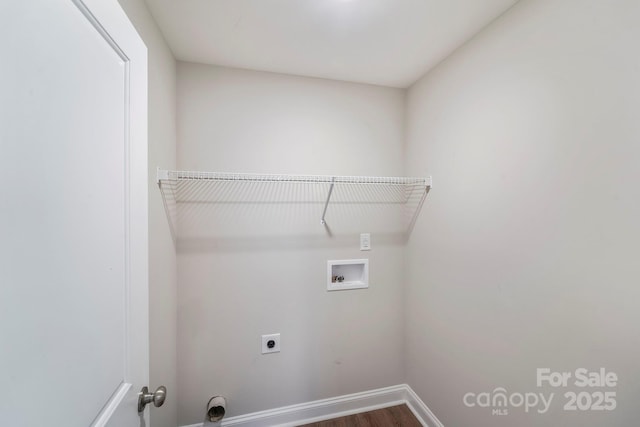 668 Smith St, Kannapolis, NC 28083 - laundry area with washer hookup, hookup for an electric dryer, dark wood-style flooring, and baseboards