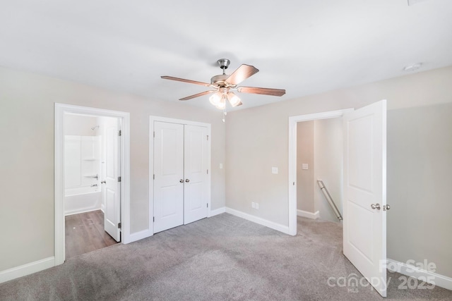 668 Smith St, Kannapolis, NC 28083 - unfurnished bedroom featuring carpet, baseboards, a closet, connected bathroom, and ceiling fan