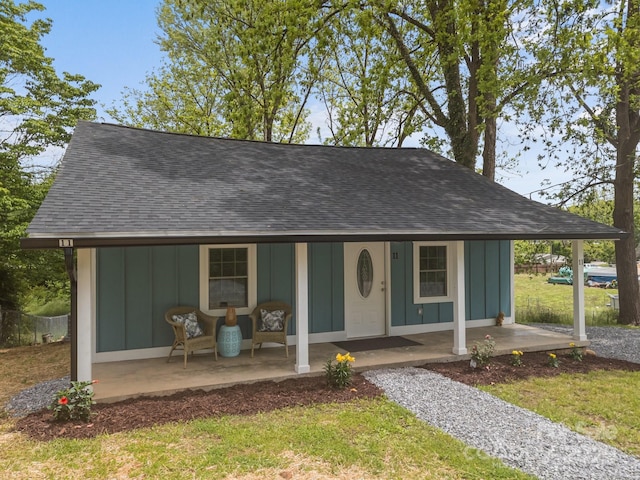 11 Mountain View Anx, Old Fort, NC 28762 - country-style home featuring board and batten siding, a shingled roof, covered porch, and a front yard