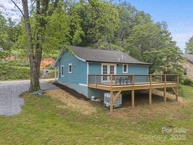 11 Mountain View Anx, Old Fort, NC 28762 - rear view of property featuring a wooden deck, a lawn, french doors, and a shingled roof