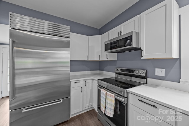 11 Mountain View Anx, Old Fort, NC 28762 - kitchen with appliances with stainless steel finishes, white cabinetry, light countertops, and dark wood-style floors