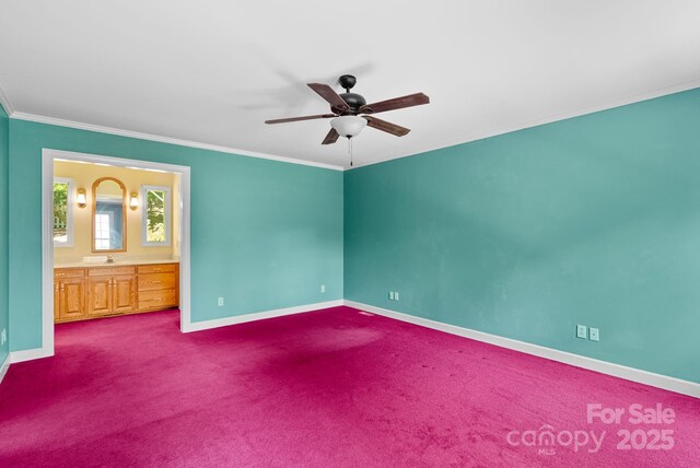 304 La Foret Dr, Morganton, NC 28655 - unfurnished bedroom featuring baseboards, ornamental molding, dark carpet, and connected bathroom