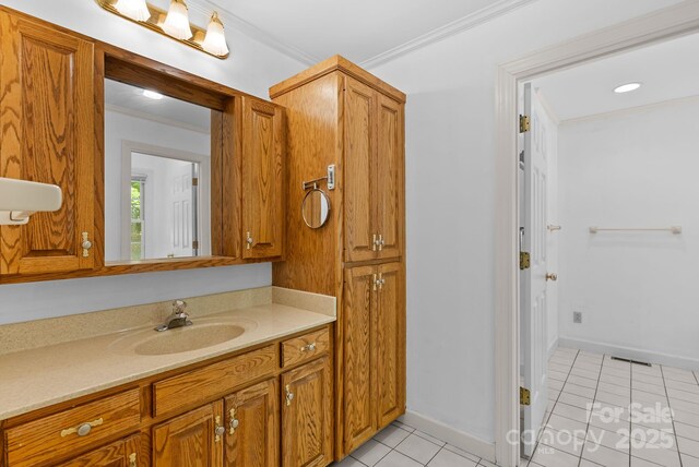304 La Foret Dr, Morganton, NC 28655 - bathroom with crown molding, tile patterned flooring, vanity, and baseboards