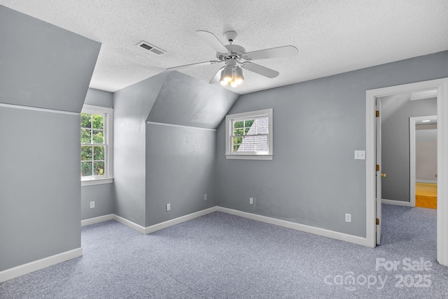 304 La Foret Dr, Morganton, NC 28655 - bonus room featuring carpet flooring, a textured ceiling, ceiling fan, baseboards, and lofted ceiling