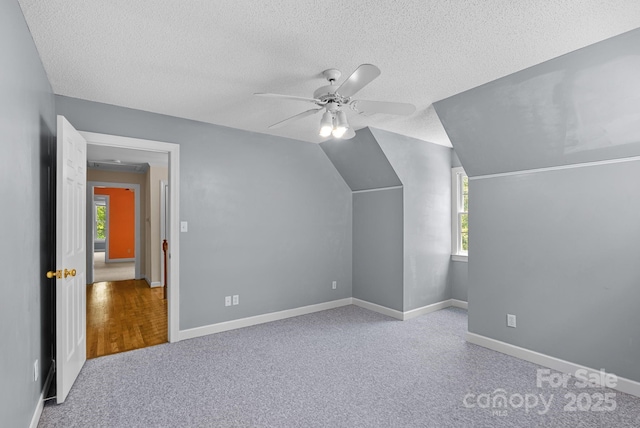 304 La Foret Dr, Morganton, NC 28655 - additional living space featuring plenty of natural light, carpet flooring, a ceiling fan, a textured ceiling, and baseboards