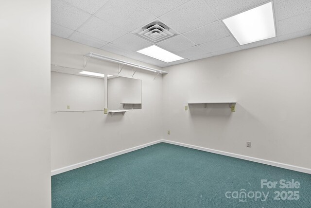 304 La Foret Dr, Morganton, NC 28655 - carpeted spare room with baseboards and a paneled ceiling