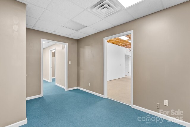 304 La Foret Dr, Morganton, NC 28655 - empty room with a paneled ceiling, carpet flooring, and baseboards