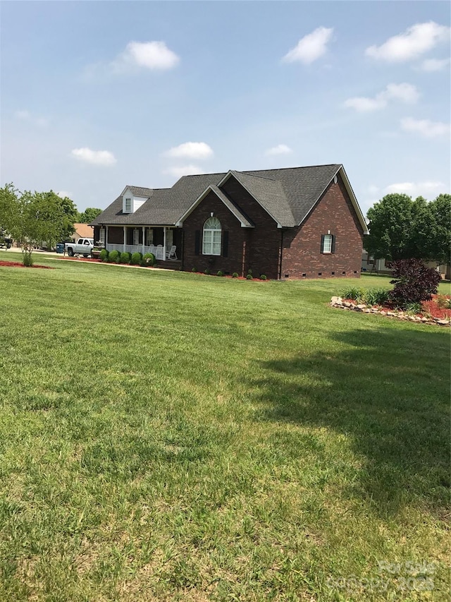 8520 Wright Rd, Kannapolis, NC 28081 - view of front facade featuring a front lawn and brick siding