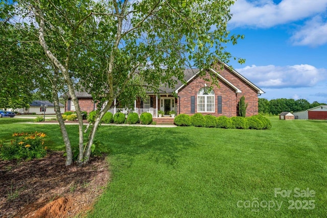 8520 Wright Rd, Kannapolis, NC 28081 - view of front facade with covered porch, a front yard, and brick siding
