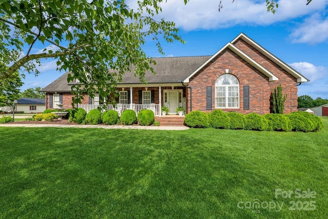 8520 Wright Rd, Kannapolis, NC 28081 - ranch-style home with brick siding, covered porch, and a front lawn