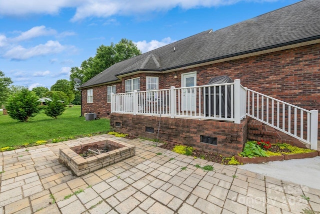 8520 Wright Rd, Kannapolis, NC 28081 - view of patio featuring a fire pit and central air condition unit