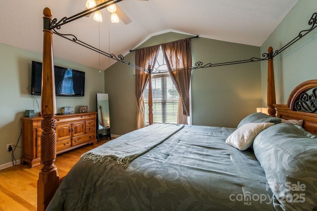 8520 Wright Rd, Kannapolis, NC 28081 - bedroom with wood finished floors, lofted ceiling, and baseboards
