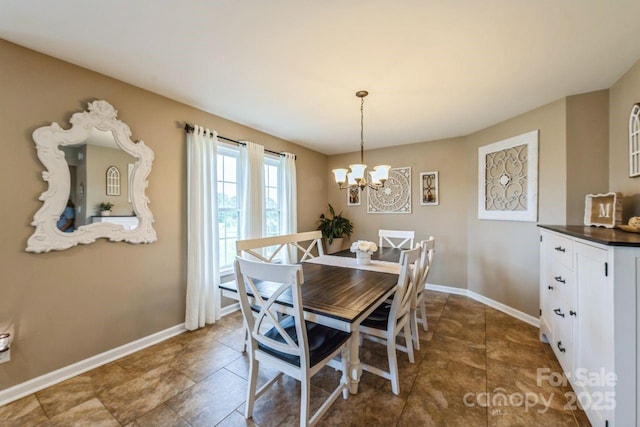 8520 Wright Rd, Kannapolis, NC 28081 - dining room with a chandelier and baseboards