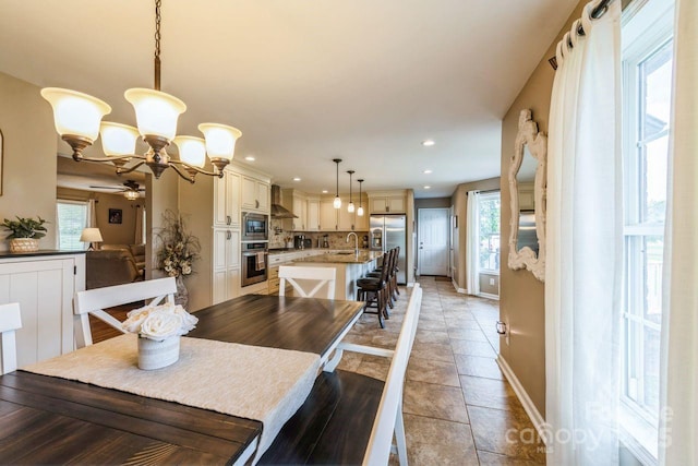 8520 Wright Rd, Kannapolis, NC 28081 - dining room with baseboards, a chandelier, a ceiling fan, light tile patterned floors, and recessed lighting