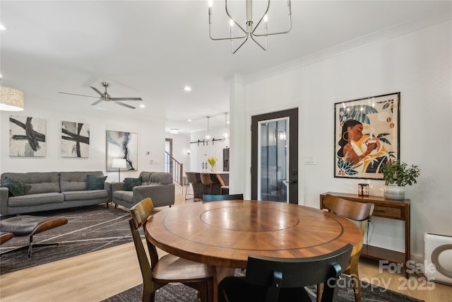 324 Elm St, Belmont, NC 28012 - dining room featuring a chandelier, wood finished floors, ornamental molding, ceiling fan, and recessed lighting