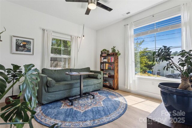 324 Elm St, Belmont, NC 28012 - living area with ceiling fan and wood finished floors