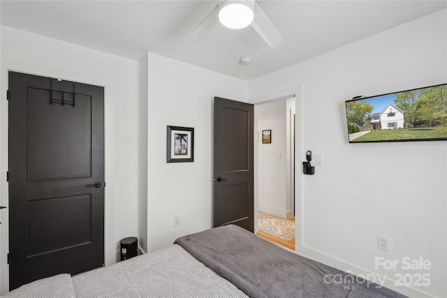 324 Elm St, Belmont, NC 28012 - bedroom with a ceiling fan and baseboards
