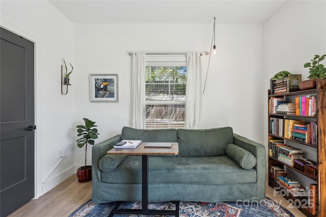 324 Elm St, Belmont, NC 28012 - sitting room with wood finished floors and baseboards
