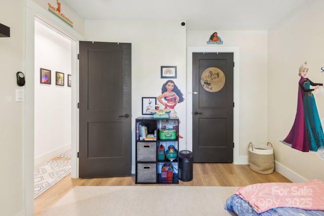 324 Elm St, Belmont, NC 28012 - bedroom featuring wood finished floors and baseboards