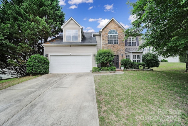 2017 White Cedar Ln, Waxhaw, NC 28173 - traditional-style house featuring driveway, a front yard, an attached garage, and stone siding