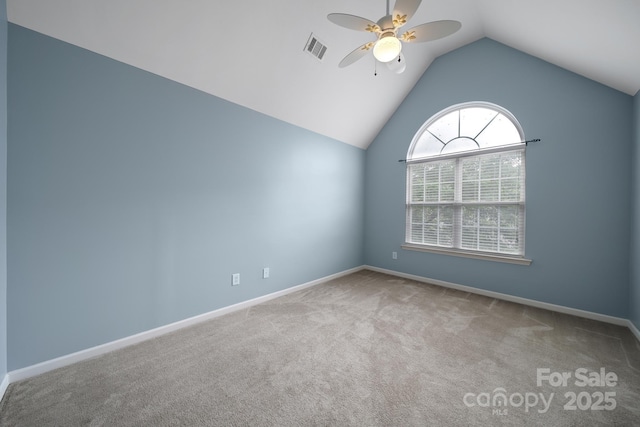 2017 White Cedar Ln, Waxhaw, NC 28173 - empty room featuring carpet flooring, ceiling fan, vaulted ceiling, and baseboards