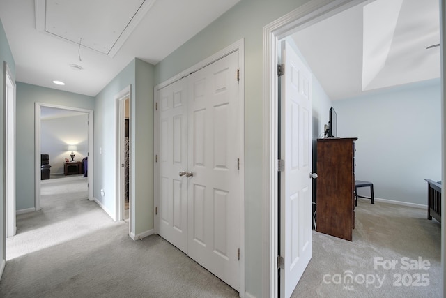 2017 White Cedar Ln, Waxhaw, NC 28173 - corridor featuring attic access, light colored carpet, and baseboards