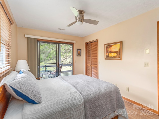 336 Stoney Ridge Loop, Maggie Valley, NC 28751 - bedroom featuring wood finished floors, access to outside, a closet, a ceiling fan, and baseboards
