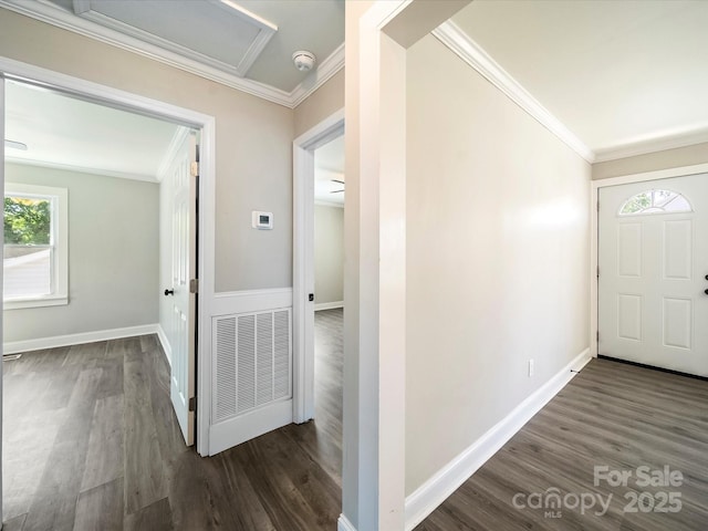 83 Woodsdale Pl SE, Concord, NC 28025 - entryway with dark wood-type flooring, ornamental molding, and baseboards