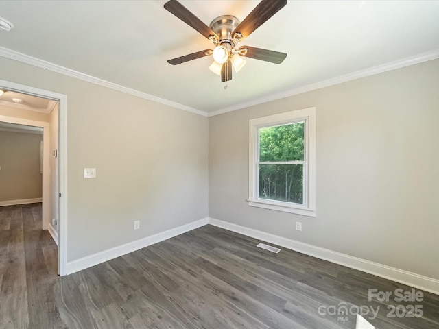 83 Woodsdale Pl SE, Concord, NC 28025 - spare room with baseboards, dark wood-type flooring, crown molding, ceiling fan, and a smoke detector