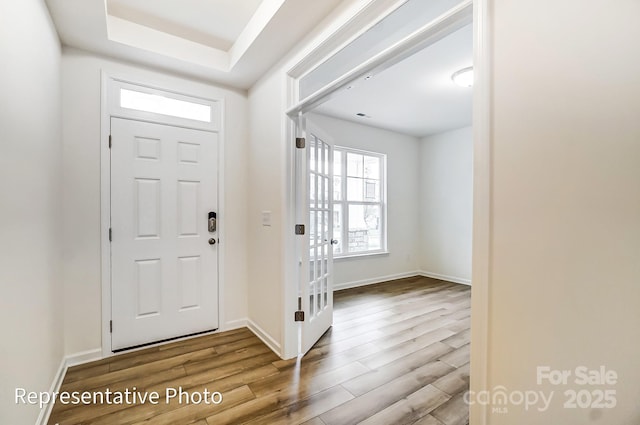 8619 Frank Grier Rd Unit 3, Charlotte, NC 28215 - foyer entrance featuring wood finished floors and baseboards
