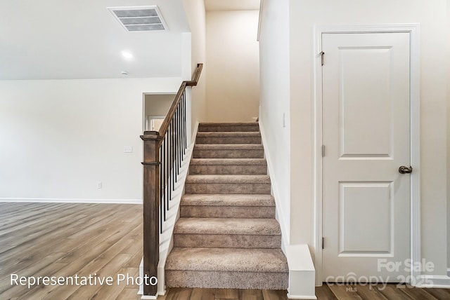 8619 Frank Grier Rd Unit 3, Charlotte, NC 28215 - stairway featuring wood finished floors and baseboards