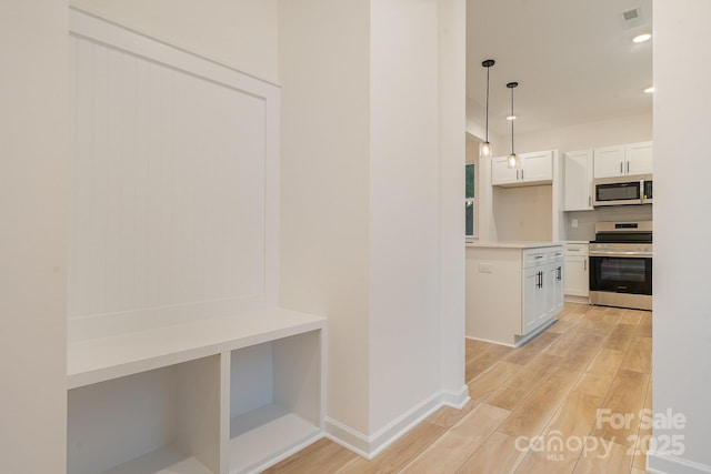 318 Sixth St, Belmont, NC 28012 - mudroom featuring light wood-style floors and baseboards
