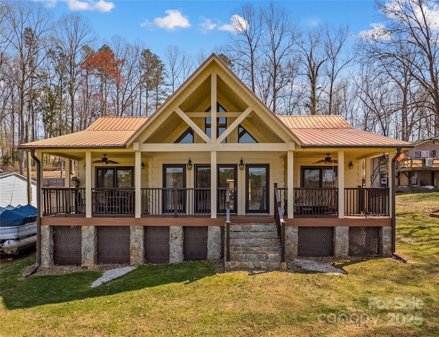 3062 Bass Dr, Sherrills Ford, NC 28673 - rear view of property with ceiling fan, covered porch, a lawn, and stone siding