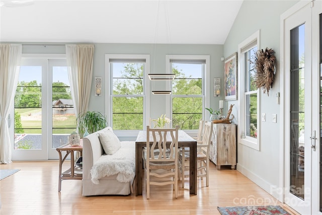 sunroom with french doors and vaulted ceiling