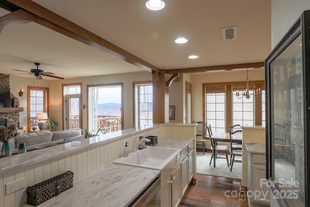 61 Creekside Way Unit G/101, Burnsville, NC 28714 - kitchen featuring fridge, recessed lighting, a sink, ceiling fan, and a chandelier