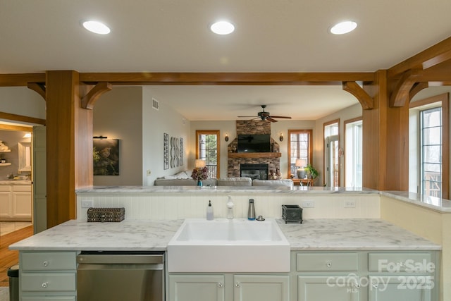 61 Creekside Way Unit G/101, Burnsville, NC 28714 - kitchen featuring stainless steel dishwasher, open floor plan, ceiling fan, a sink, and green cabinetry