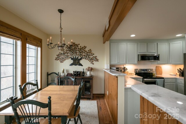 61 Creekside Way Unit G/101, Burnsville, NC 28714 - dining area with a chandelier, light wood-style floors, recessed lighting, and beamed ceiling