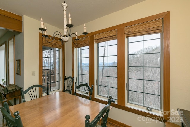 61 Creekside Way Unit G/101, Burnsville, NC 28714 - dining area with a chandelier