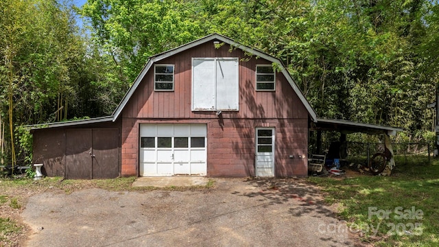 1 Ola Dr, Candler, NC 28715 - garage featuring a detached garage and asphalt driveway
