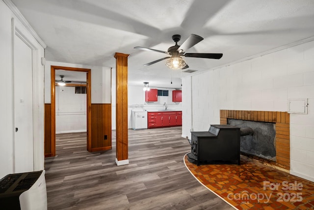 1 Ola Dr, Candler, NC 28715 - living area featuring ceiling fan, dark wood finished floors, and concrete block wall