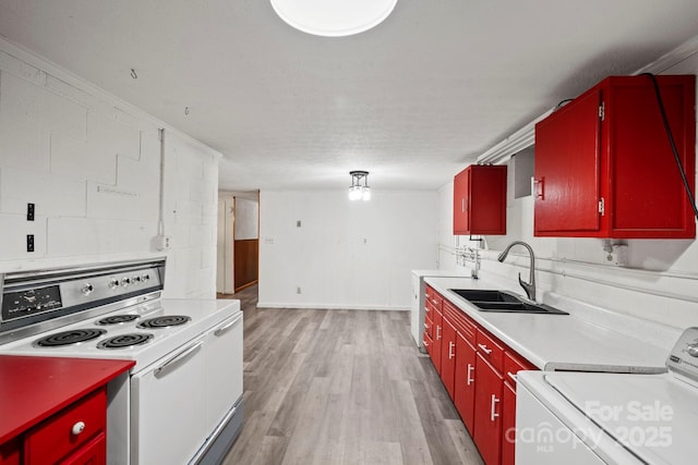 1 Ola Dr, Candler, NC 28715 - kitchen featuring red cabinets, white electric range, a sink, washer / dryer, and stove